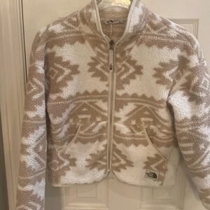 Tan/cream North Face fleece jacket size 10/12 girls